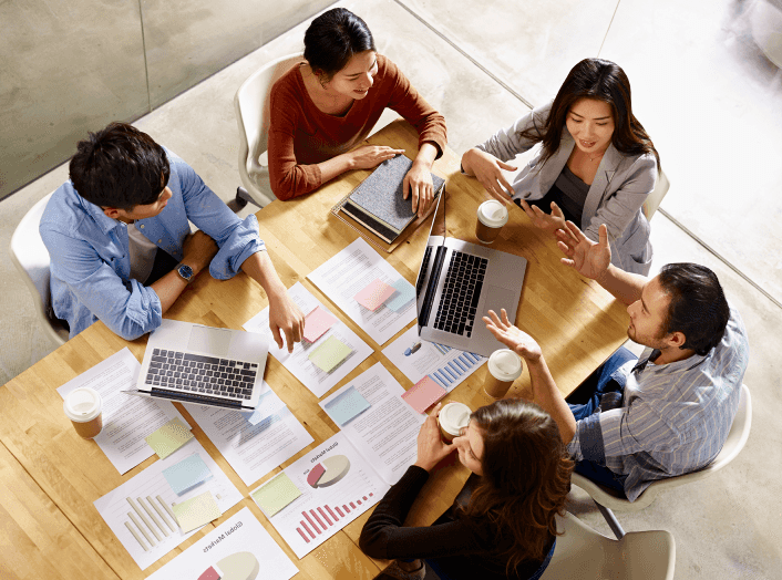 A birds eye view of Clearlinkers gathered in a meeting
